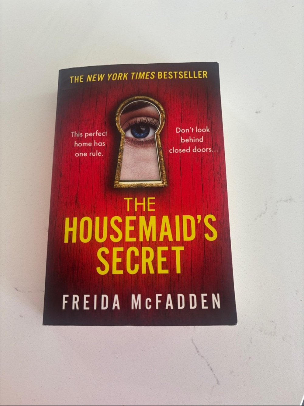 The Housemaid's Secret — Red Paperback by